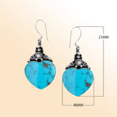 Sterling silver turquoise heart earrings with pearl accents, handmade in Bali
Elegant turquoise heart earrings with pearls, perfect gift for women